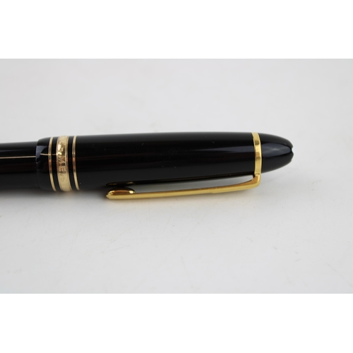 242 - Montblanc Classique Ballpoint Pen, with twist-action black resin barrel and gold-tone banding and cl... 