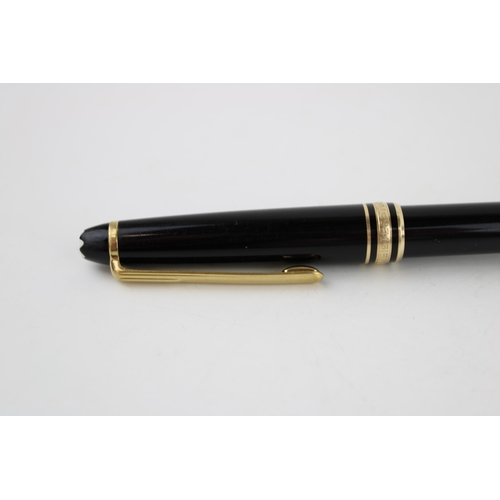 243 - Montblanc Meisterstuck Black Rollerball Pen, with a pull draw cap and gold plate banding and clip, s... 