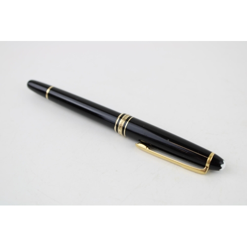 244 - Montblanc Classique Rollerball Pen, with twist-action black resin barrel, gold-tone banding and clip... 