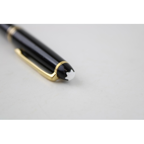 244 - Montblanc Classique Rollerball Pen, with twist-action black resin barrel, gold-tone banding and clip... 