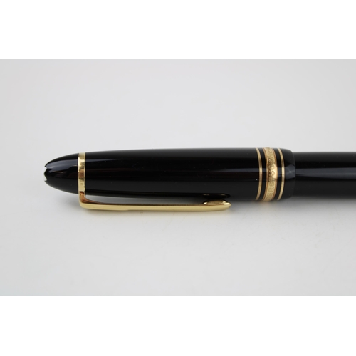 246 - Montblanc Meisterstuck 146 Fountain Pen in black with one broad and two narrow gold bands, 14ct bi-c... 