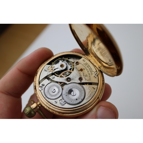 248 - A 9ct gold cased, keyless wind Waltham pocket watch the signed white enamel dial, with Roman numeral... 