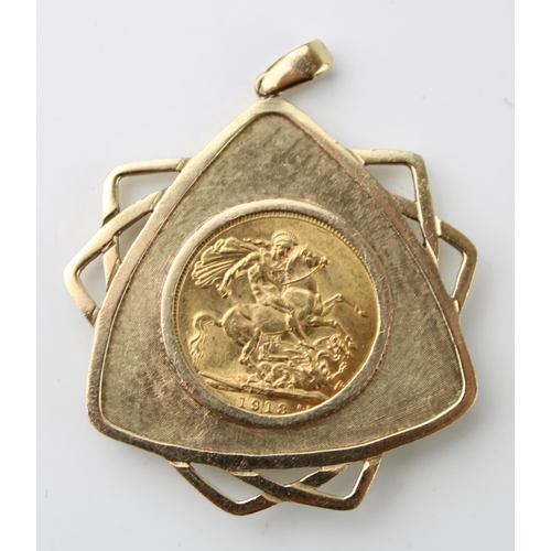 255 - A George V full Sovereign, 1913, in 9ct gold, possibly Masonic mount, total weight 16.1g.