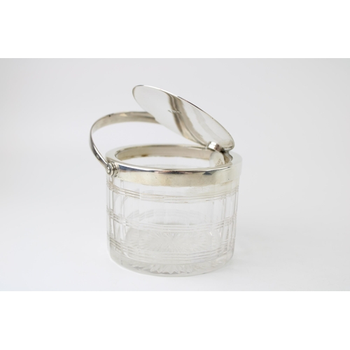 262 - Silver and glass preserve pot, lid opens with handle movement, Birmingham 1908, Heath and Middleton,... 