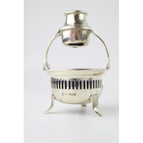 266 - Silver sugar and spice set, Sheffield 1920, J Rogers, 67.2g, blue glass liner, 10.5cm tall.