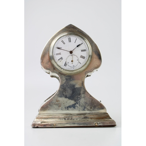 267 - Silver Art Nouveau mantel clock, wooden back, with key, Birmingham 1912, J D W D, 11.5cm tall.