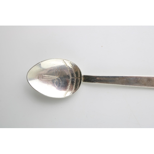 269 - Silver Arts & Crafts table spoon, London 1994, J O Craven, 12.5cm long, tribal face to bowl, 24.3g.