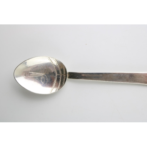 269 - Silver Arts & Crafts table spoon, London 1994, J O Craven, 12.5cm long, tribal face to bowl, 24.3g.