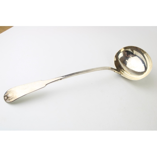 277 - A Scottish silver George IV ladle, fiddle pattern with shell escutcheon, John Heron, Glasgow 1824, 2... 