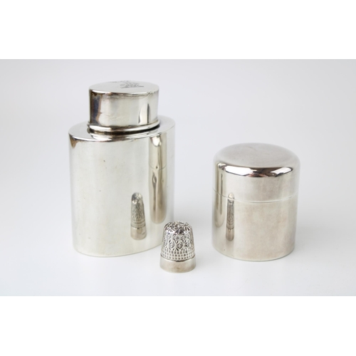 278 - A silver travelling tea-caddy, of oval cylindrical form, with gilt interior to the body and lid, arm... 