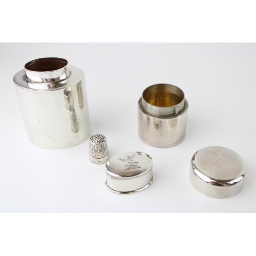 278 - A silver travelling tea-caddy, of oval cylindrical form, with gilt interior to the body and lid, arm... 