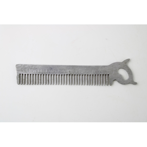 29 - Early 20th century advertising comb 'USE ATKINS SAWS' in aluminium.  Likely to be E.C. Atkins & Co, ... 