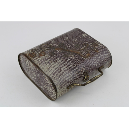 3 - An early 20th century Huntley & Palmer, Art Nouveau faux shagreen tin biscuit tin in the form of a h... 