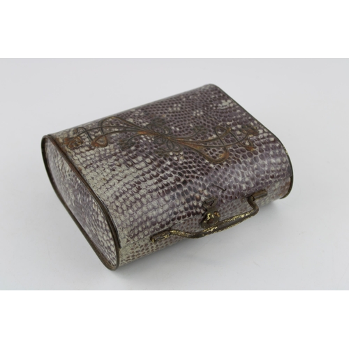 3 - An early 20th century Huntley & Palmer, Art Nouveau faux shagreen tin biscuit tin in the form of a h... 