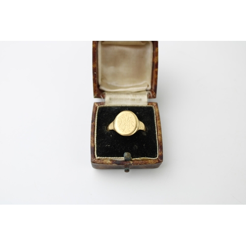 331 - An 18ct gold signet ring, monogram engraved, size T, 5.2g.