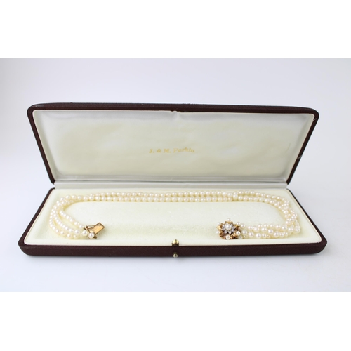 357 - A three strand pearl chocker with 9ct gold, diamond and pearl set clasp of starburst form, total wei... 