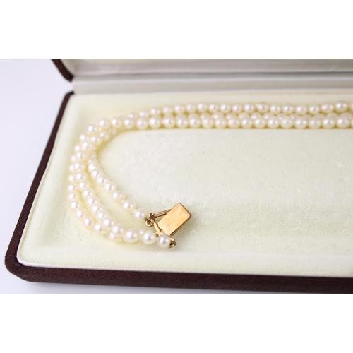 357 - A three strand pearl chocker with 9ct gold, diamond and pearl set clasp of starburst form, total wei... 