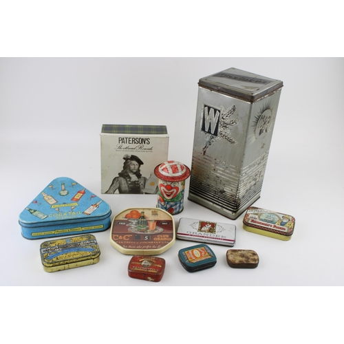 40B - A collection of advertising tins to include examples by 'Huntley & Palmers', 'Cap-Tins' clown tin, a... 