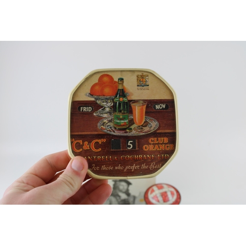 40B - A collection of advertising tins to include examples by 'Huntley & Palmers', 'Cap-Tins' clown tin, a... 