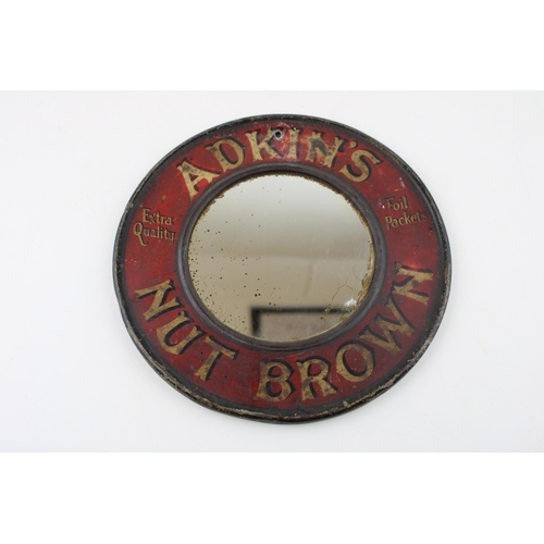 41 - An early twentieth century point of sale 'Adkin's' 'Nut Brown' advertising mirror on tin. Diameter 2... 