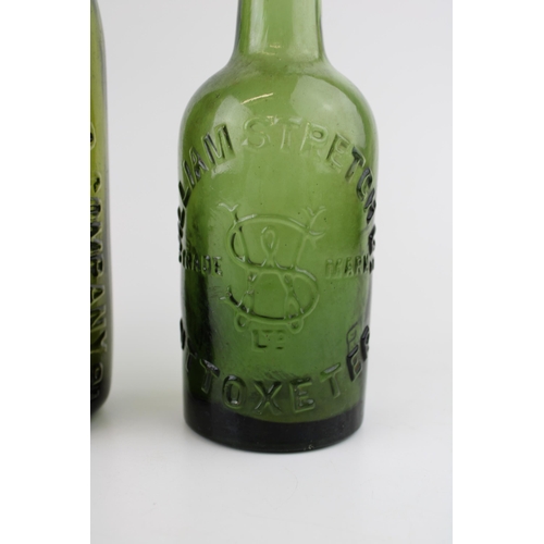 49 - A collection of three advertising beer bottles to include 'The Phoenix Brewery Co Ltd' Heywood toget... 