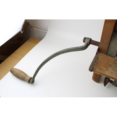 54 - An early c20th Universal portable clothes wringer or mangle horse shoe brand, 68cm wide.