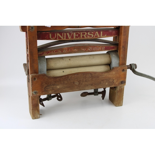 54 - An early c20th Universal portable clothes wringer or mangle horse shoe brand, 68cm wide.