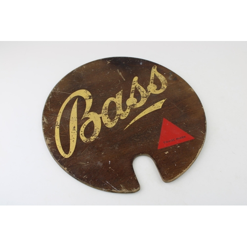 6 - A 'Bass' Brewery 'Bass Ales' advertising panel on wood. 29cm x 29cm.