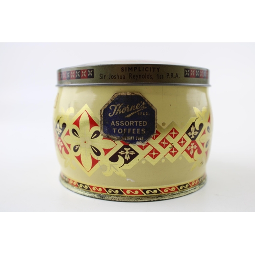 74 - Thorne's Assorted Toffees tin featuring 'Simplicity' by Sir Joshua Reynolds, 1st P.R.A. Height 8cm.