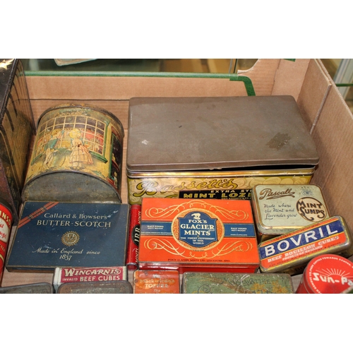 88 - A mixed collection of advertising tins to include 'Bovril', 'Sun Pat', 'Parkinson's', 'Fox's Glacier... 