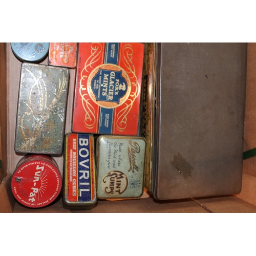 88 - A mixed collection of advertising tins to include 'Bovril', 'Sun Pat', 'Parkinson's', 'Fox's Glacier... 