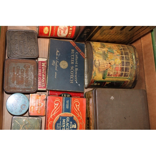 88 - A mixed collection of advertising tins to include 'Bovril', 'Sun Pat', 'Parkinson's', 'Fox's Glacier... 