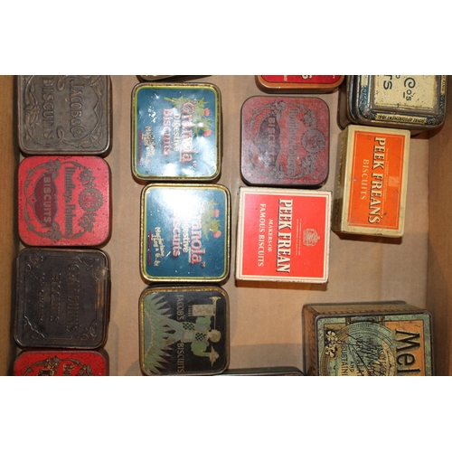 92 - A mixed collection of advertising tins to include 'Jacob & Co Biscuits', 'Peek Freen Biscuits', 'McV... 