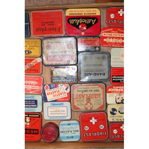 94 - A collection of advertising tins relating to first aid to include plaster tins, band - aids and othe... 