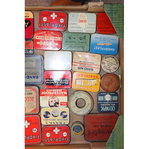 94 - A collection of advertising tins relating to first aid to include plaster tins, band - aids and othe... 