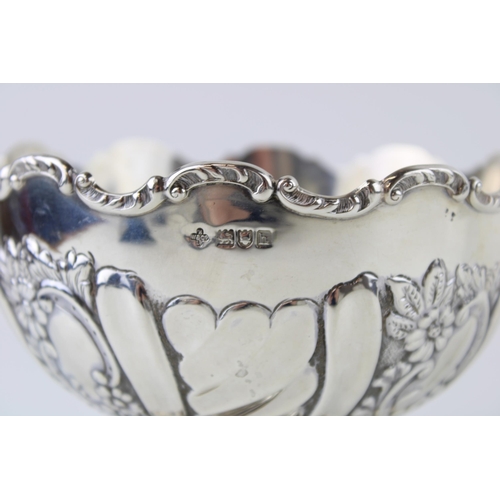 290 - An Edwardian silver rose bowl, in the rococo style, with rocai scalloped rim, chased and repouse flo... 