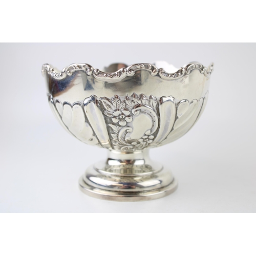 290 - An Edwardian silver rose bowl, in the rococo style, with rocai scalloped rim, chased and repouse flo... 