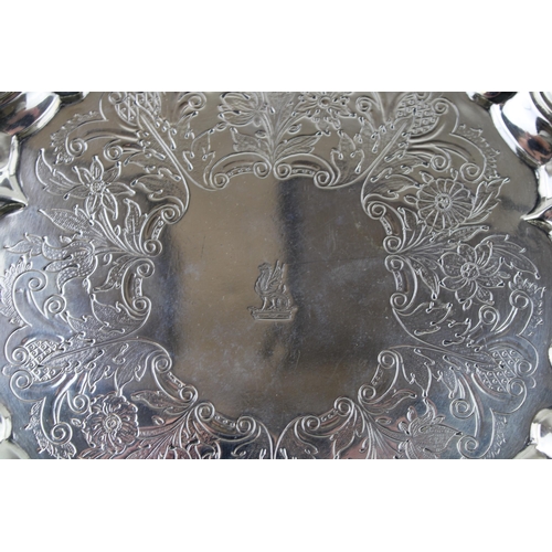 292 - A George III silver salver with bright cut floral engraving, and chased and repousse rococo border, ... 