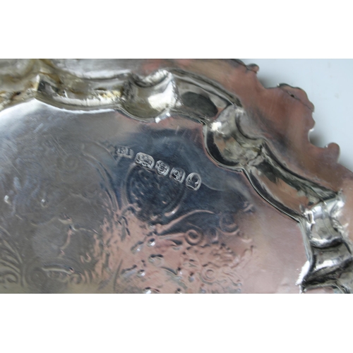 292 - A George III silver salver with bright cut floral engraving, and chased and repousse rococo border, ... 