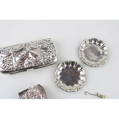 299 - A group of silver items comprising a Victorian spectacles case with chatalaine belt clip and fob, a ... 