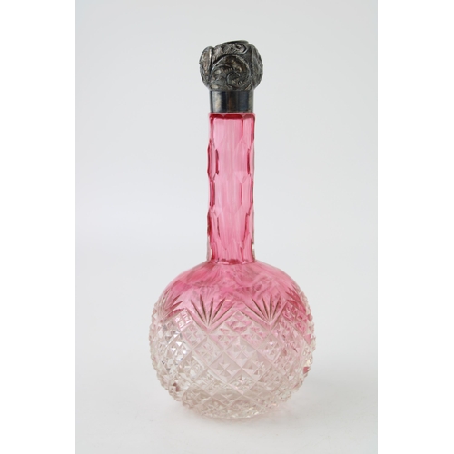 305 - Silver pink glass perfume bottle, pineapple form, silver topped, 16.5cm tall.