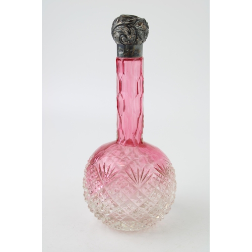 305 - Silver pink glass perfume bottle, pineapple form, silver topped, 16.5cm tall.