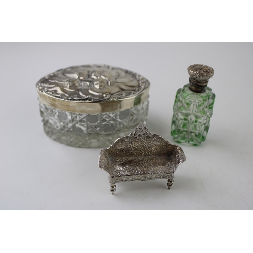 314 - Silver to include a miniature model of an arched back settee, a silver topped glass jar with Reynold... 