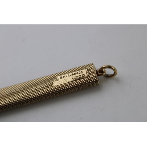 318 - Samson Mordan & Co 9ct gold pencil case / needle case, textured handle, empty, 7.2g, 9cm long.