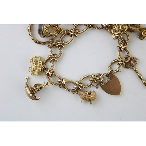 339 - A 9ct gold charm bracelet, the oval links with textured twist and having heart shaped padlock clasp,... 