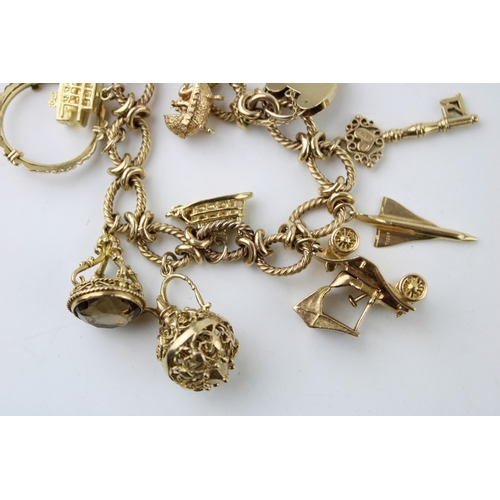 339 - A 9ct gold charm bracelet, the oval links with textured twist and having heart shaped padlock clasp,... 