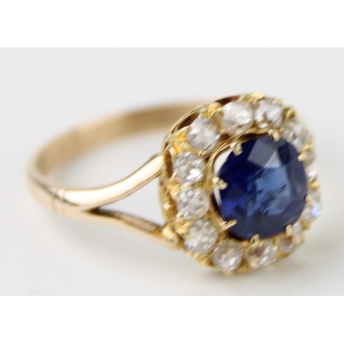 341 - A 9ct gold diamond and sapphire dress ring, the oval cut sapphire of approximately 7 by 6.5mm, surro... 