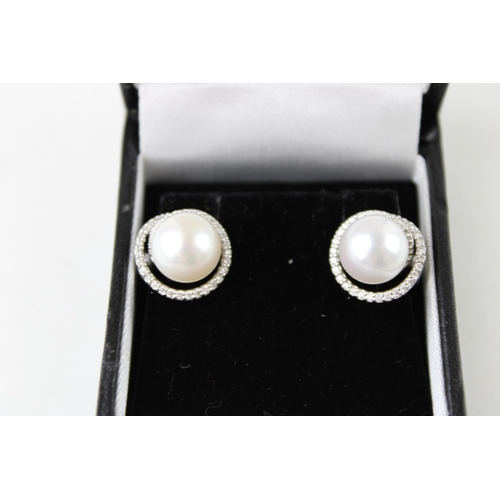 346 - A pair of 18ct white gold, diamond and pearl earrings, pearls approximately 28 grains, 7.1g.