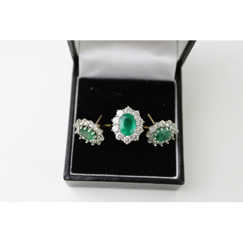 349 - An 18ct gold, diamond and emerald dress ring, the oval cut emerald of approximately 8.2 by 6.4mm, su... 