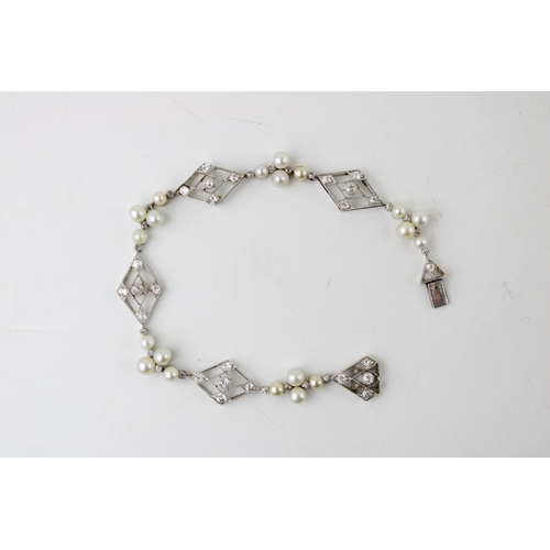 358 - An Art Deco, diamond, pearl and platinum set bracelet, of ten alternating diamond shaped panels, 14.... 